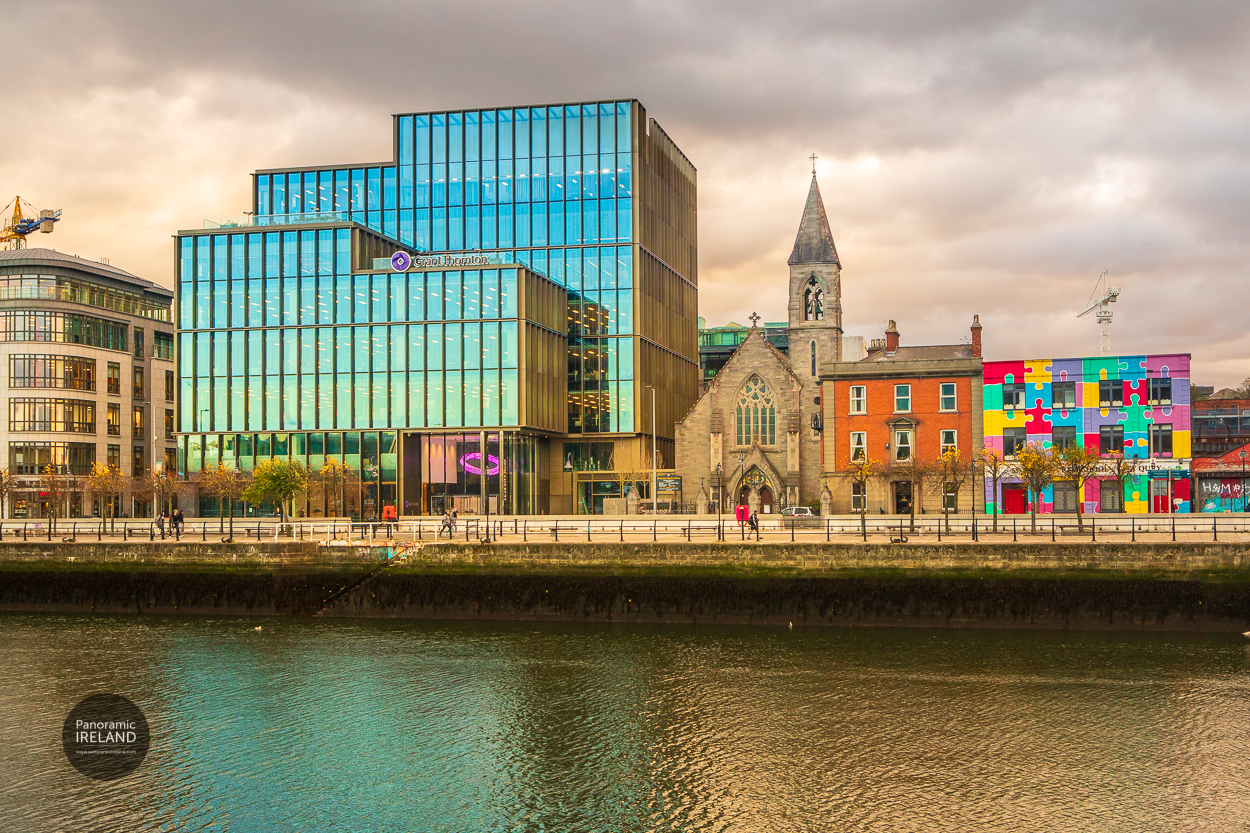 Church of the Immaculate Heart and modern buildings on Dublin's River Liffey Church of the Immaculate Heart and modern buildings on Dublin's River Liffey
