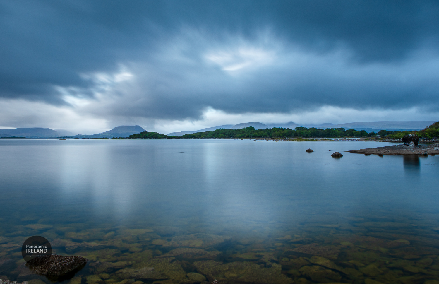 Blue Hour Begins in the West of Ireland Blue Hour begins in the west of Ireland with clouds swirling over mountains and a lake