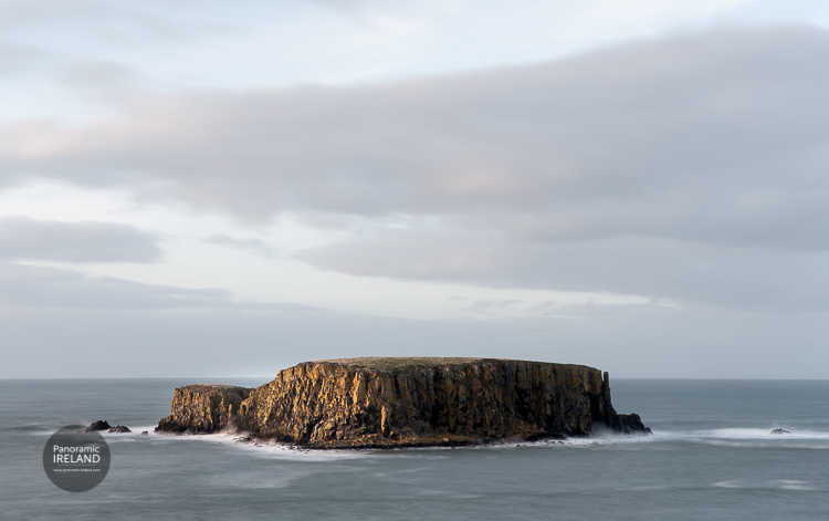 Sheep Island. Ballintoy, County Antrim at sunset. This island is well known and catches the evening sunlight.