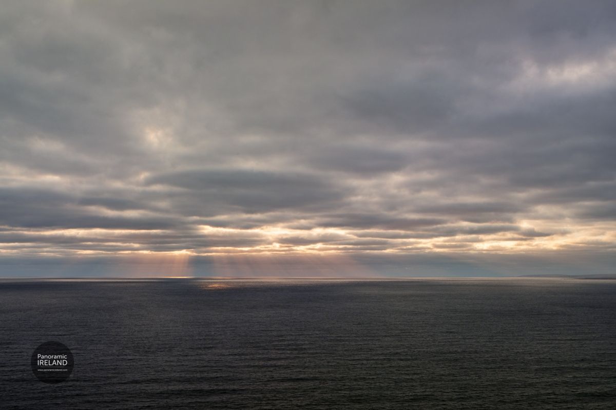 Calm Evening and Sun Rays at Sunset on the Atlantic